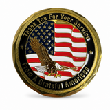 Gold challenge coin front, American flag and eagle