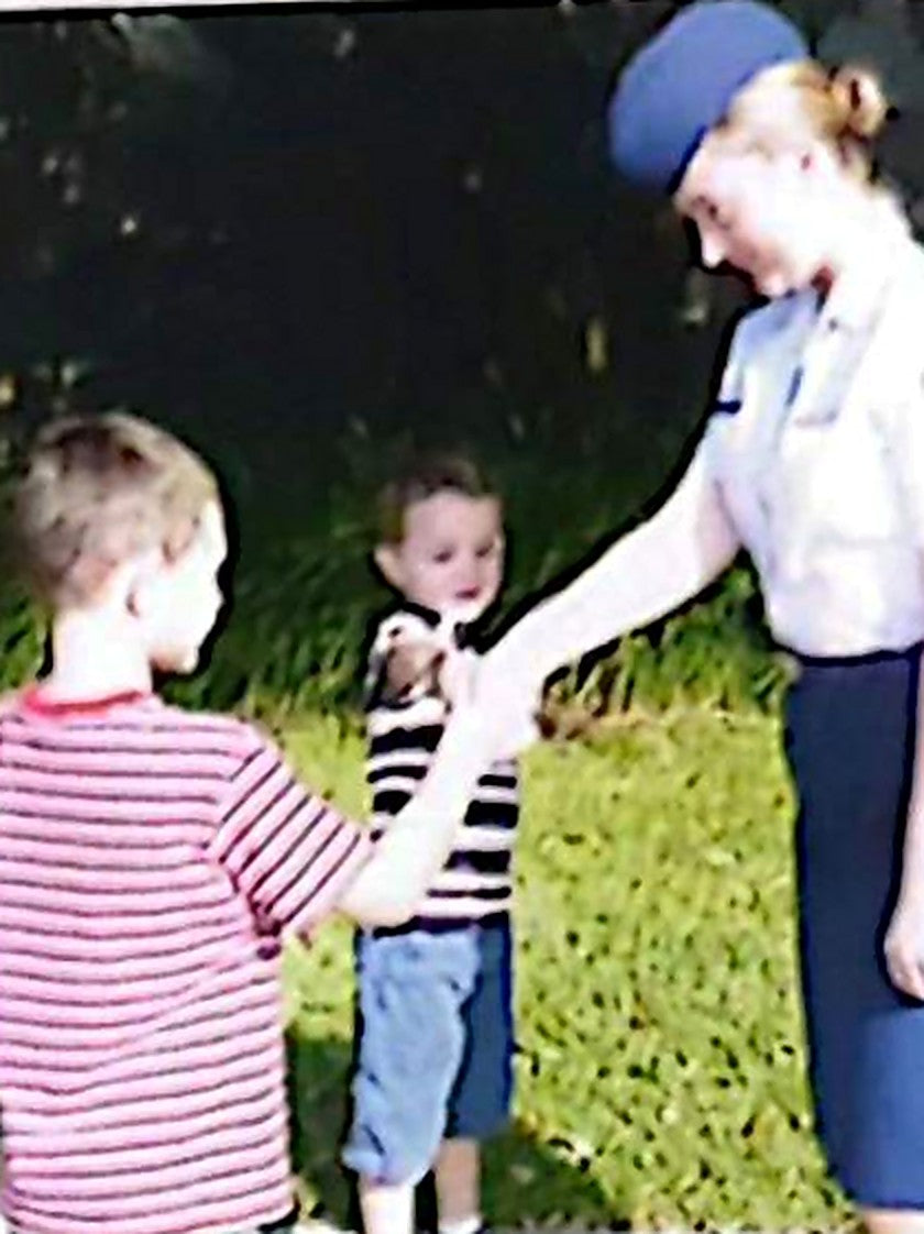 Deb Benson's young sons Brock and Max thank a young airman in 2007, the moment that started Grateful American Coin